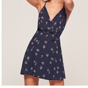 Reformation Costa Wrap Mini Dress in a navy blue floral print size S